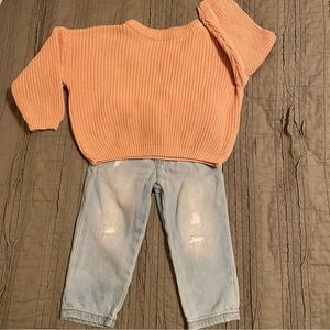 Distressed jeans and sweater outfit for baby.